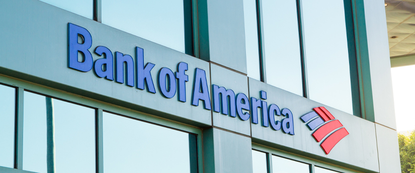 The Bank of America sign on a building, representing the presence of the financial institution in the area.