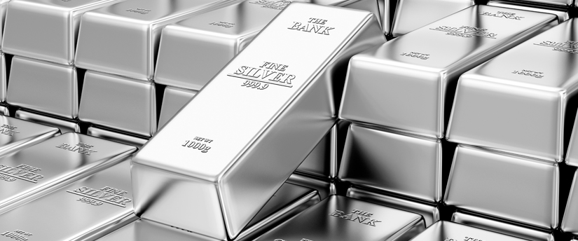 Silver bars representing global economic prospects, highlighting the role of precious metals in financial outlooks.
