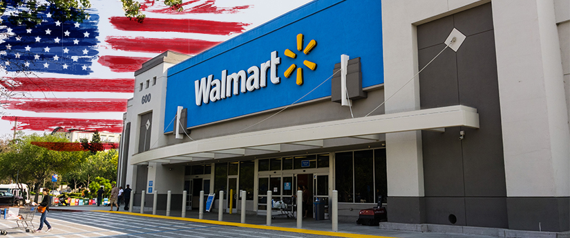 The Walmart sign displayed on a building, symbolizing the presence of the retail giant in the vicinity.