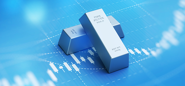 Two silver bars on a blue graph referring to how to trade silver online