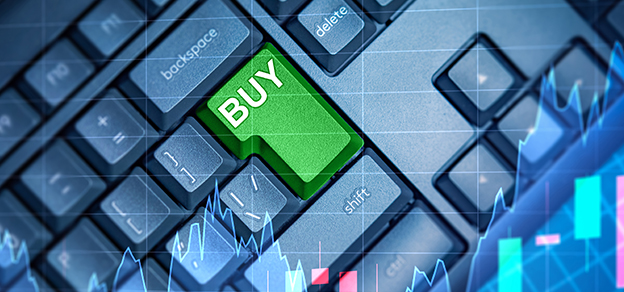 a keyboard shows a green Buy button relating to how to buy stocks.