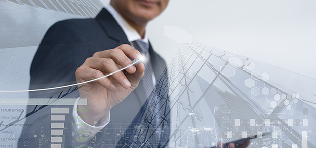 a man writing on a board with a skyscraper behind him referring to real forex trading