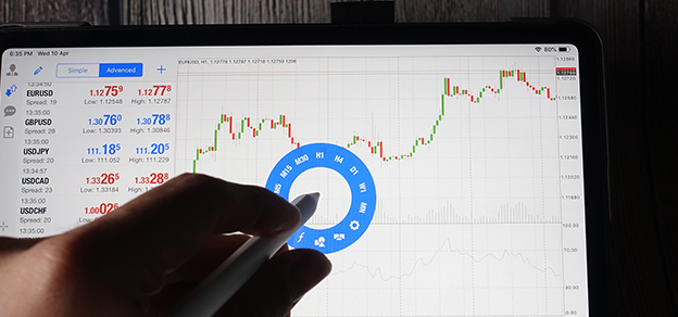 On the screen of a powerful device, you can see a detailed and live presentation of MT4 trading data, charts, and financial indicators.