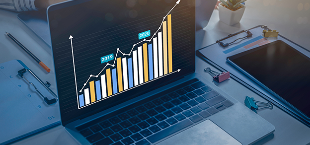image with laptop screen displaying technical trading chart related to economic calendars for forex trading