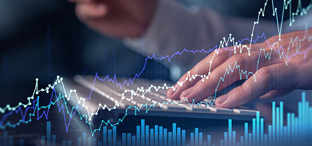 A trader, engrossed in typing on his keyboard, surrounded by candlestick charts, symbolizes the commitment to forex education and analysis.