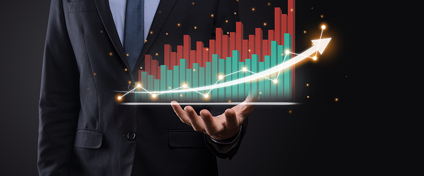 A trader holding a mobile displaying charts with an upward arrow illustrates the application of technical analysis in monitoring market trends.