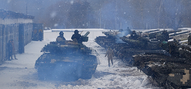 A military convoy of tanks, highlighting the Russia-Ukraine conflict, symbolizes the ongoing tension.