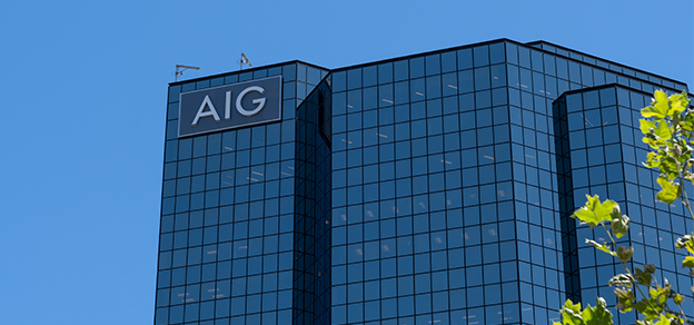 The American International Group (AIG) sign displayed on a building, signifying the presence of the insurance and financial services company.