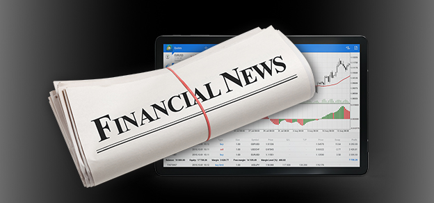 A newspaper displaying a financial news headline alongside a tablet with forex data highlights the importance of keeping up with financial news for trading and investment decisions.