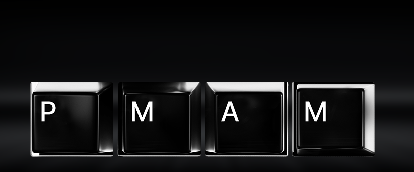 Keyboard letters closely arranged, forming the word "PMAM," representing the financial software's streamlined and efficient functionality.