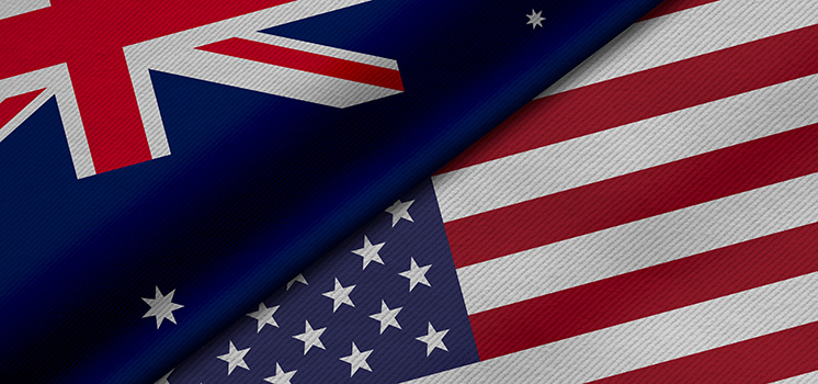 The flags of the United States and Australia together represent the AUD/USD currency pair, connecting two nations in the world of finance.