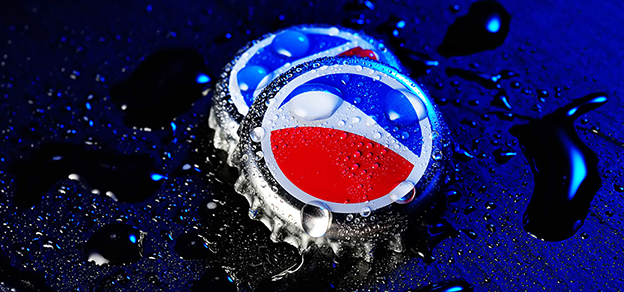 Aluminum lid of a Pepsi container, representing the iconic beverage brand and its packaging.