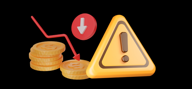 Coins alongside a danger sign with a downward arrow signify the potential risks and losses associated with financial investments.