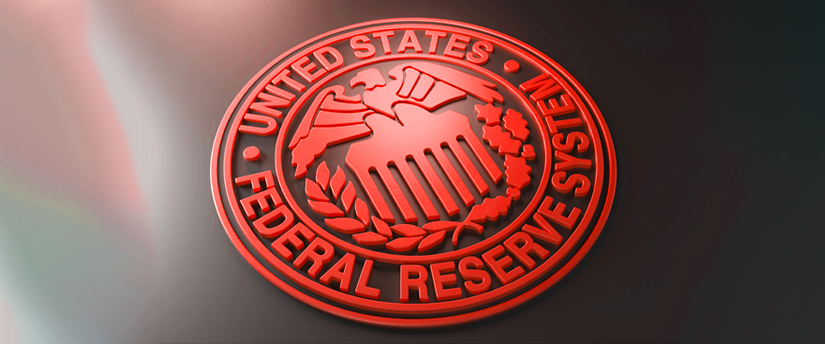 The iconic Federal Reserve System symbol shines against a dark backdrop, a beacon of financial strength and stability.