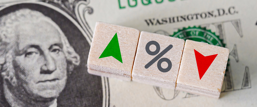 A dollar adorned with three dice, a red arrow, a green arrow, and the percentage sign—a gamble in the world of finance.