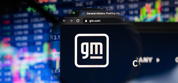 A browser tab displaying the GM logo, GN, and a board with forex data in the background.