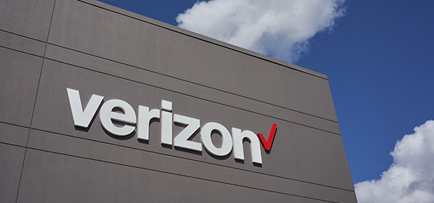 The Verizon logo prominently displayed on a building, signifying the company's presence and branding.