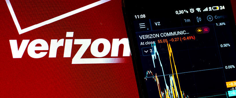 Verizon and a mobile device displaying forex data, symbolizing the connectivity of telecommunications and finance.