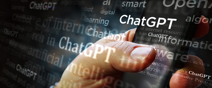 A person holds a mobile phone with the ChatGPT logo displayed prominently in the surroundings.