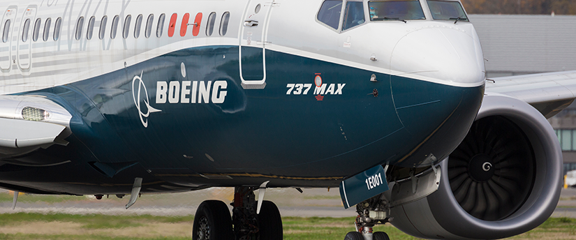 A Boeing airplane poised for takeoff, embodying the spirit of aviation and travel.