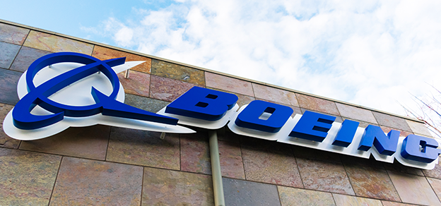 The Boeing sign on a building, representing the renowned aerospace company, Boeing.