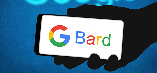 A person holding a mobile phone with the Bard AI logo displayed on the screen.