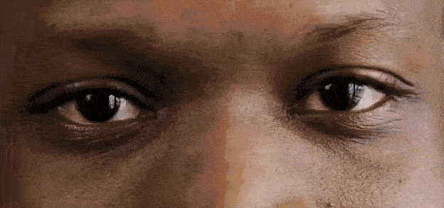Many people's eyes with the IBM logo, signifying the watchful gaze and influence of IBM in technology.