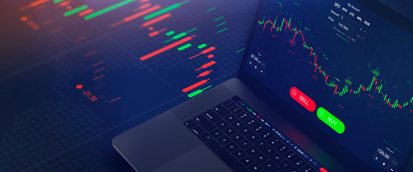 A laptop displaying candlestick charts, highlighting the analytical features of a trading platform.