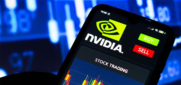 A user holding a mobile with the Nvidia logo, backed by candlestick charts, symbolizing the synergy of technology and finance.
