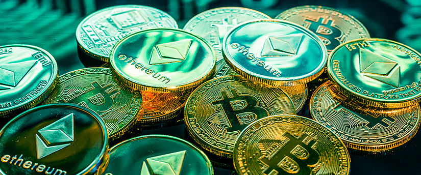 Bitcoin and Ethereum coins, emblematic of the cryptocurrency CFDs available for trading.