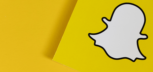 The Snapchat app icon, featuring a distinctive yellow ghost, symbolizing the popular social media platform, Snapchat.