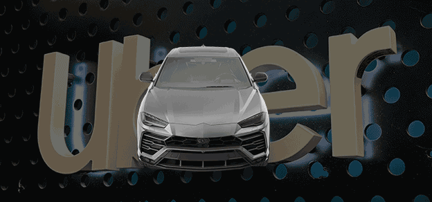 I witnessed a sleek, black car with the unmistakable emblem of Uber displayed prominently on the rear, cruising effortlessly down the street, drawing attention from passersby. 