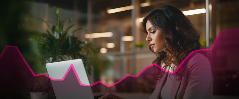 A woman sitting in front of a laptop computer, looking at a economic calendar and select which event can start trading