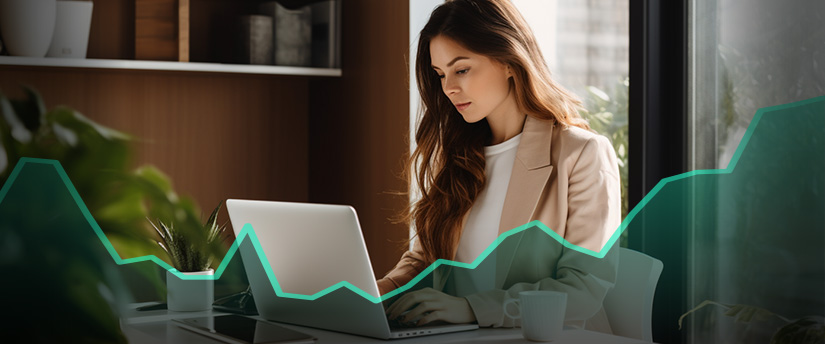 A woman at a desk with a laptop, analyzing an upward graph, engaged in popular forex trading.