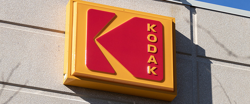 The Kodak sign proudly displayed on the facade of a building, symbolizing a legacy of imaging innovation.