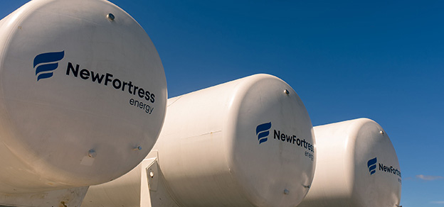 A large white tank with the New Fortress Energy