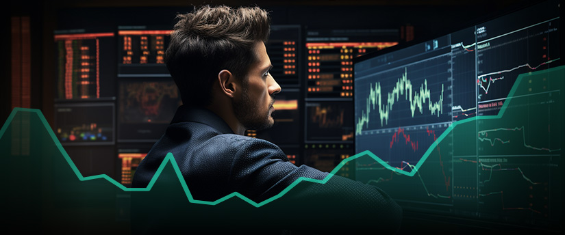 A forex trader in a suit intently examines a screen displaying a graph, focused on learning and analyzing market trends.