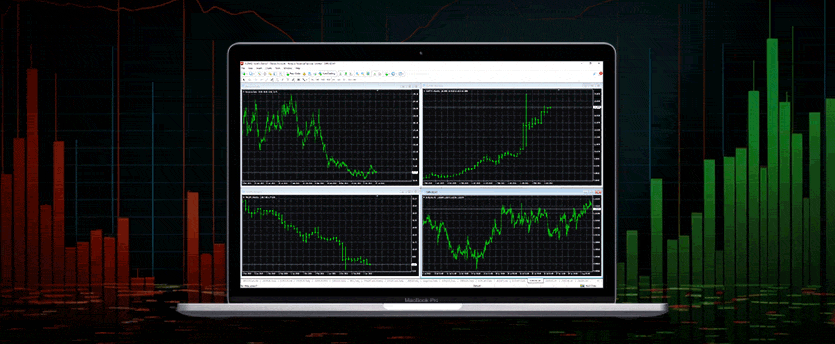 Stock chart on a laptop screen displaying market trends. A trading software called mt4 is visible on the screen.