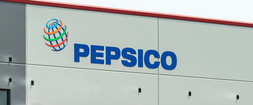 PepsiCo's acquisition of aseptic packaging solutions, depicted in the image of a Pepsi sign building.