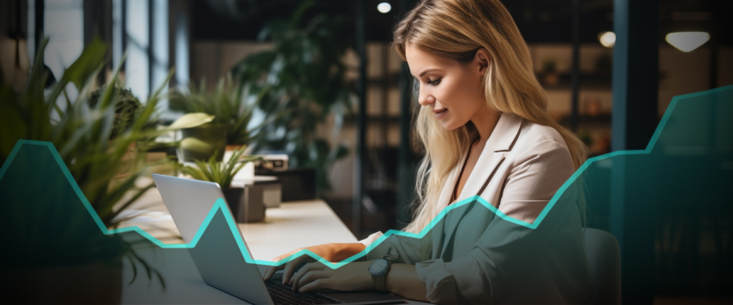 A woman trader analyzing forex strategy on her laptop with a graph chart.
