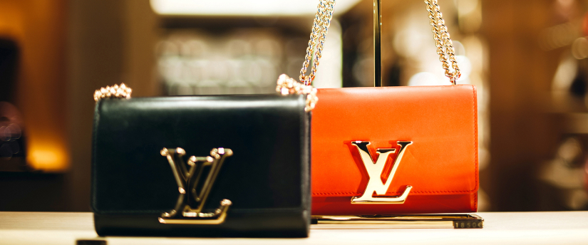 Chic black and orange Louis Vuitton small bags, a perfect blend of sophistication and style. Elevate your fashion statement with luxury accessories.