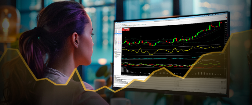 A woman studies a chart on a screen, analyzing trading strategy options.