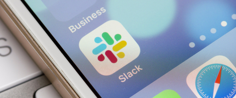 Effortless Communication: Slack Logo on a Smartphone, Unleashing Seamless Collaboration on the Go