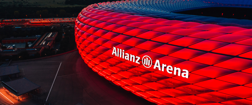 Allianz Arena, home of Bayern Munich, illuminated by stadium lights