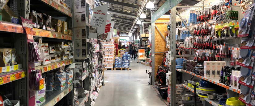 A well-stocked store aisle with a wide variety of items on display.