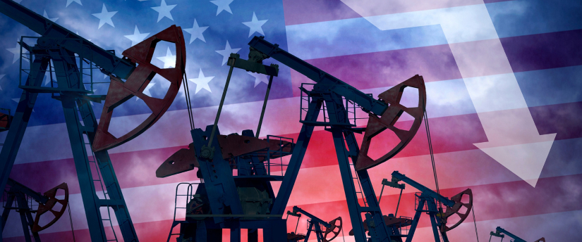 Oil pumps in front of an American flag, symbolizing energy independence and patriotism.