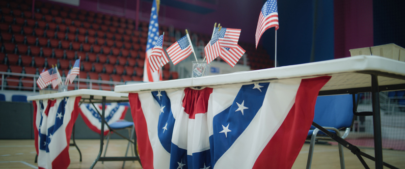 American flags and podium set up for a patriotic ceremony