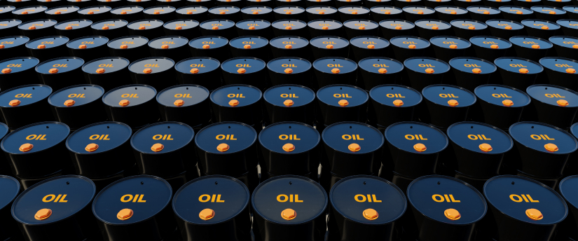 A series of oil barrels neatly stacked in rows, showcasing their cylindrical shape and metallic surface.