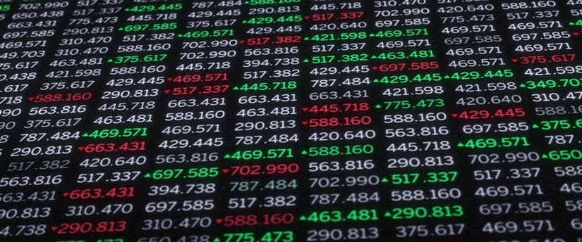 Stock market quotes displayed on a digital screen, showcasing real-time financial data and market trends.