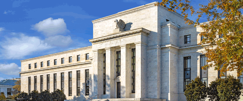 The Federal Reserve building in Washington, DC, symbolizing central banking and market analysis in the United States.